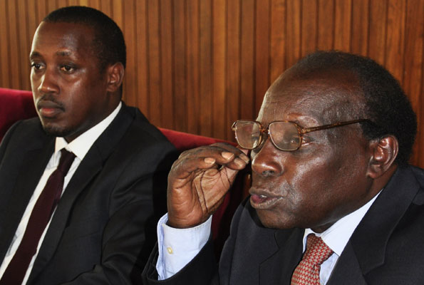 Western youth MP Gerald Karuhanga and his lawyer, Mr George Kanyeihamba, at a press conference at Parliament yesterday. They say the acting Chief Justice Steven Kavuma is illegally appointed to the office. PHOTO BY GEOFFREY SSERUYANGE