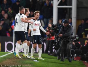 Eriksen is joined in celebration by Toby Alderweireld and Harry Kane after netting in the 78th minute of the game