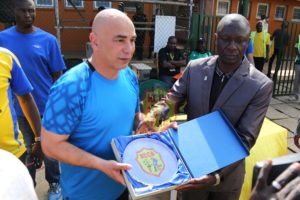 KCCA honoured AlMasry coach & Egypt legend Hossam Hassan with a KCCA FC shield before the game.