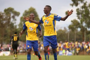 Derrick Nsibambi and Geoffrey Sserunkuma celebrate 