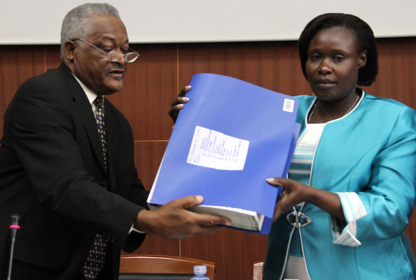 UNEB Board Chairman Fagil Mandy and Education Minister Jesca Alupo at a previous event